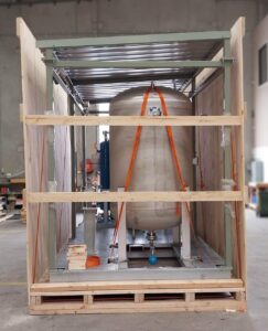 machine inside wooden shipping crate