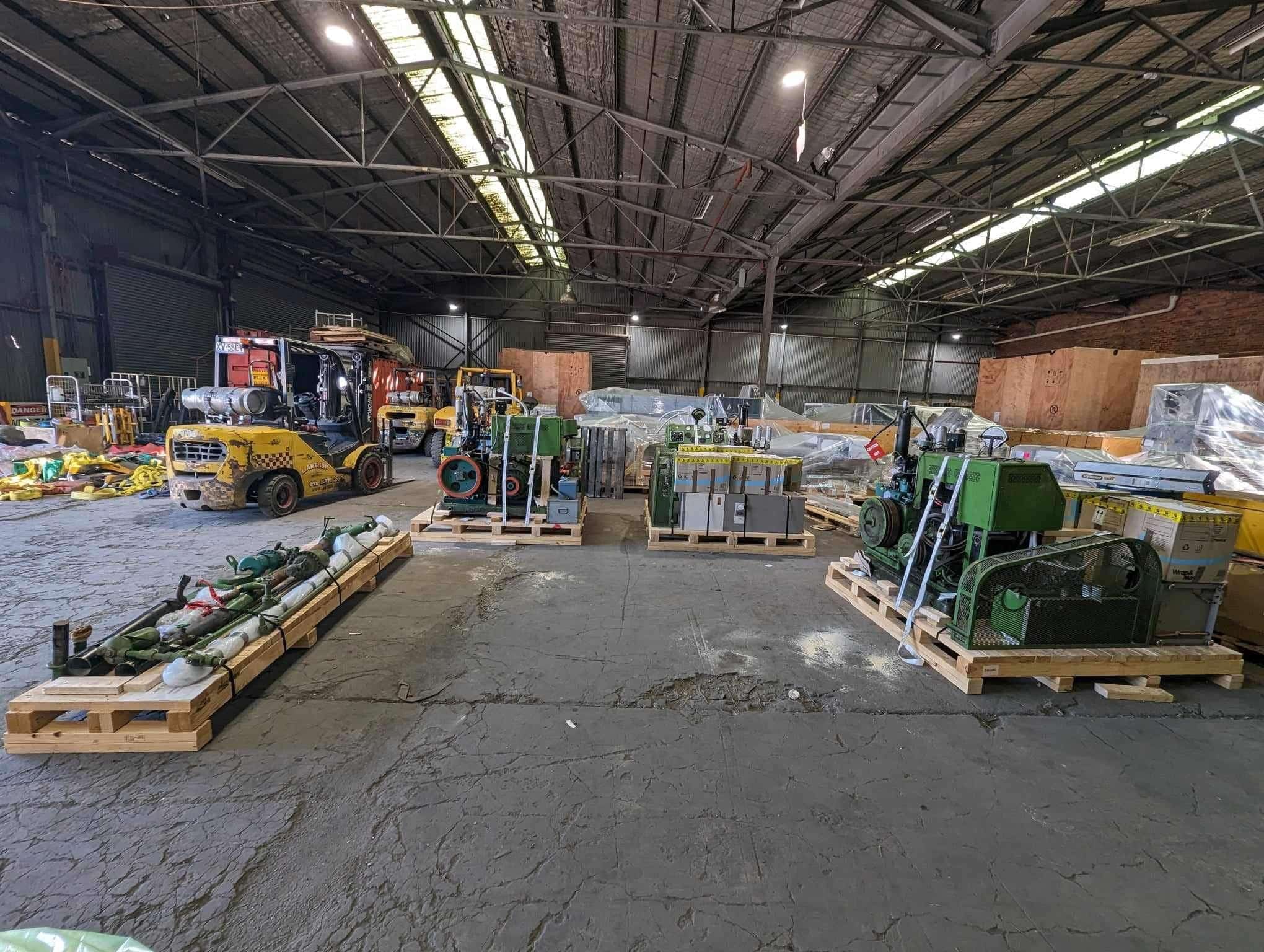 machines and custom wooden pallets