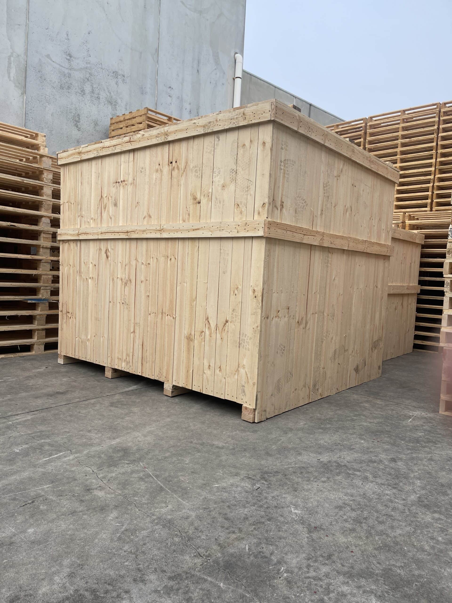 wooden shippping case with pallet stacked in background