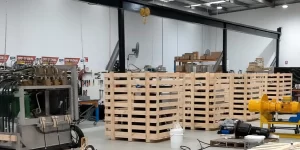 machinery being packed into wooden crates