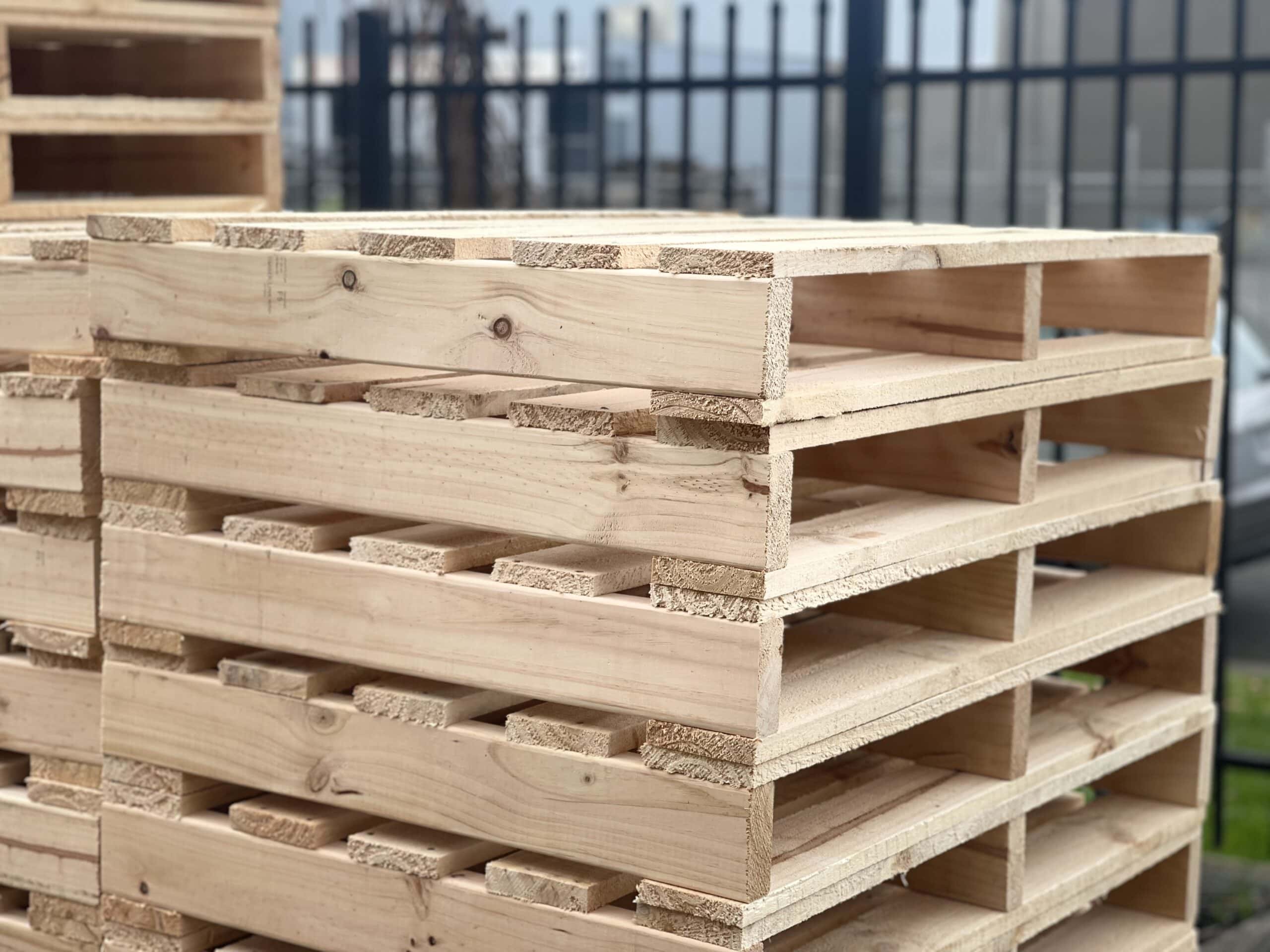 timber pallet with crate n pack solutions logo in the background