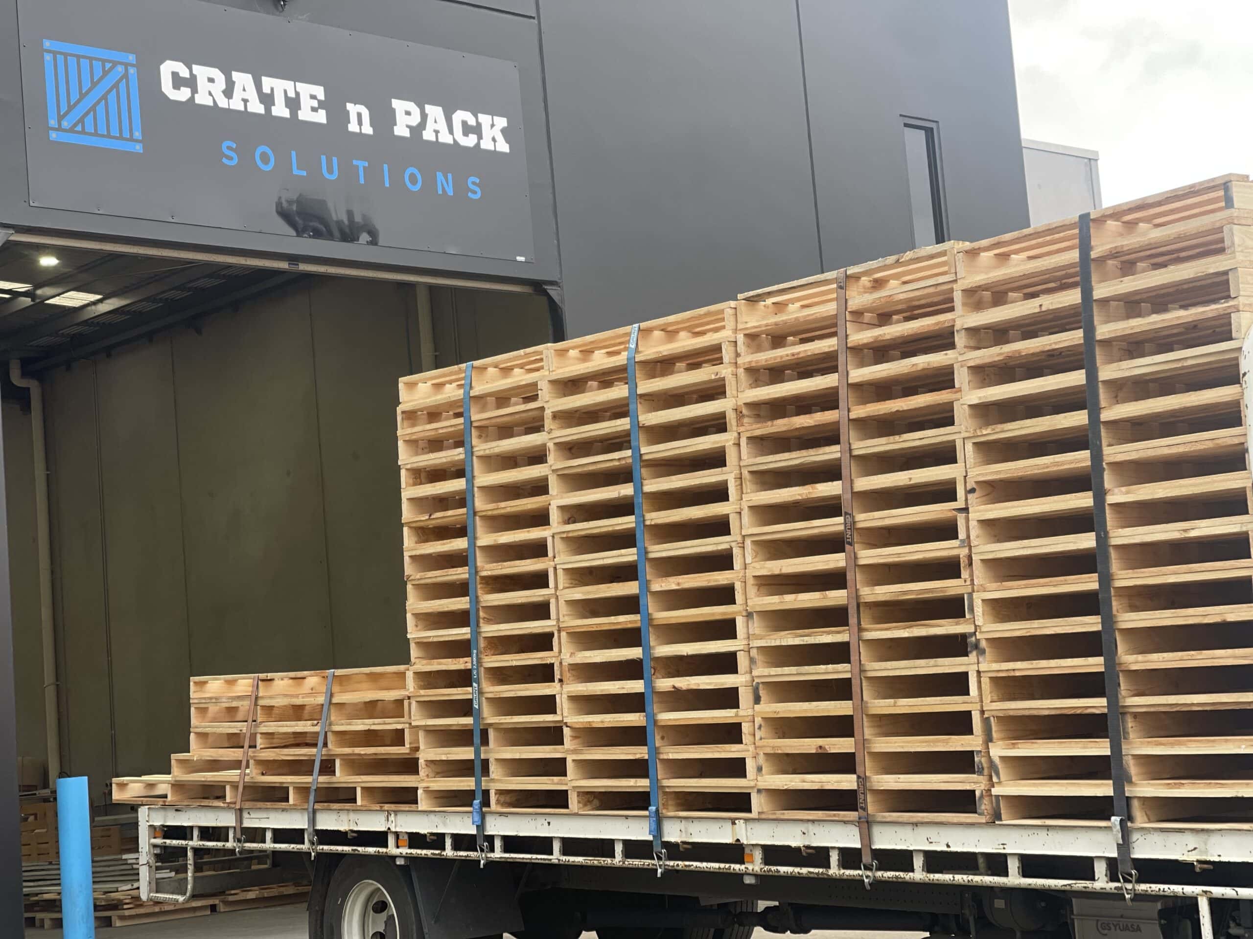 pallets with crate n pack log in background