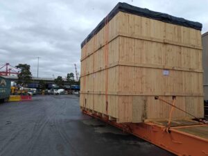 wooden shipping crate on shipping container