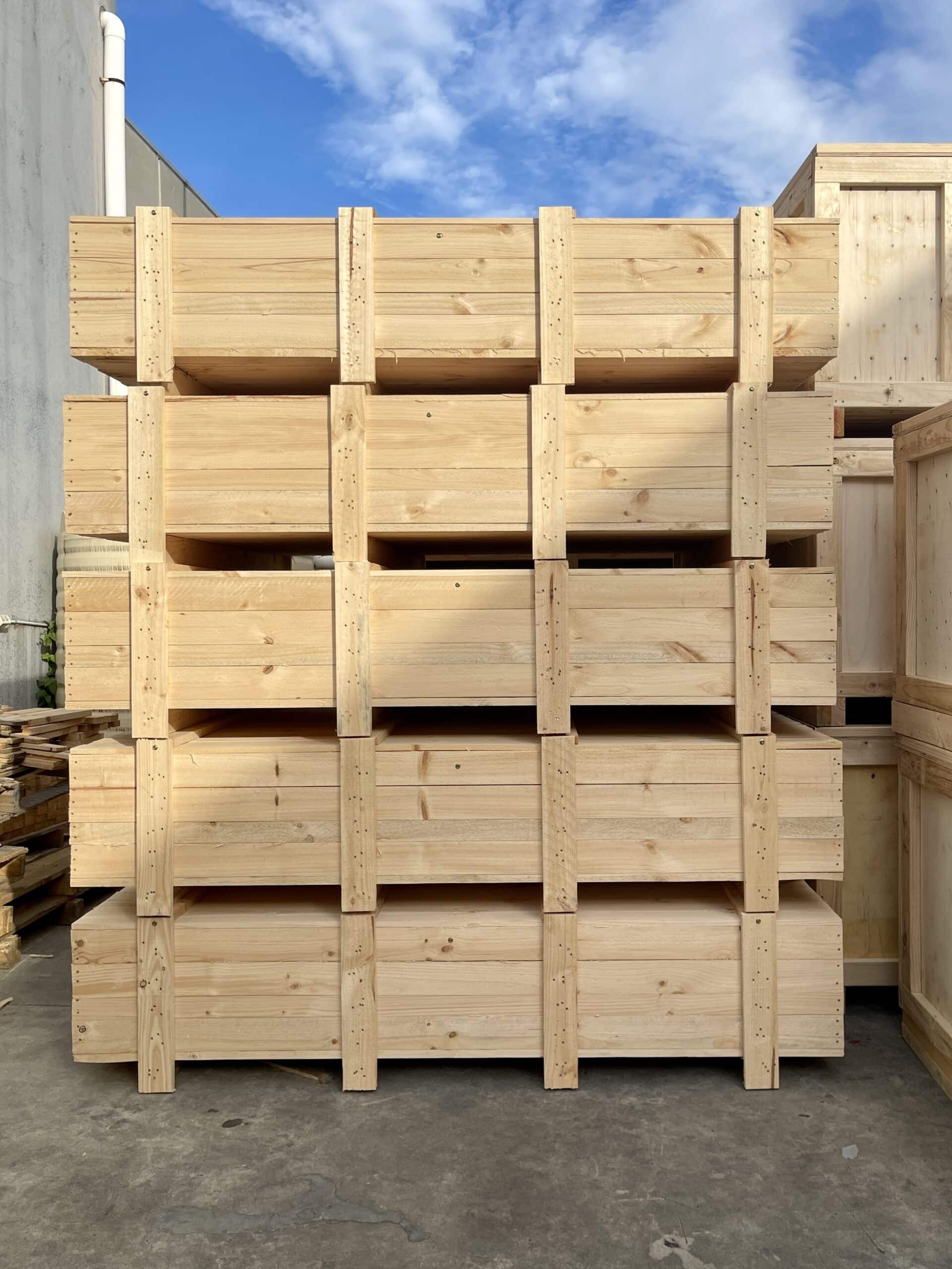 timber crates with crate n pack solutions logo in background