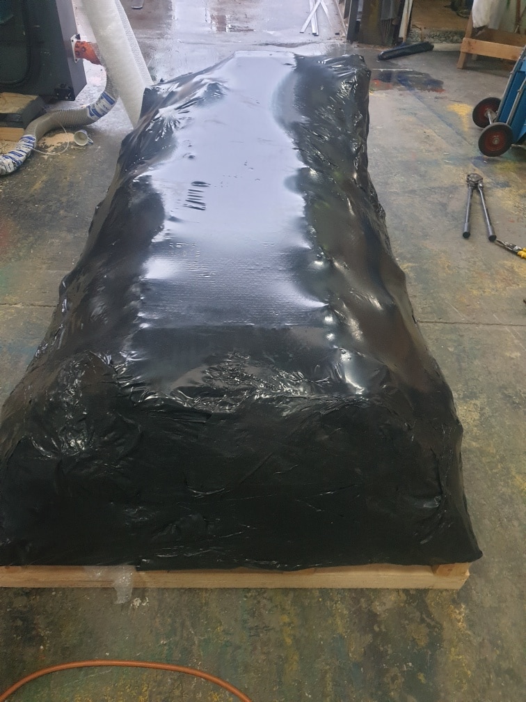 timber base and black shrink film