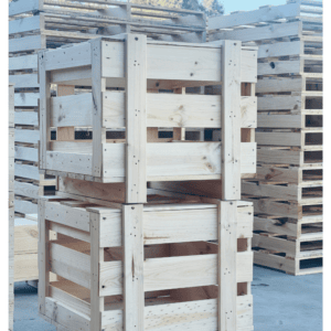 custom wooden crates stacked in Melbourne warehouse with Crate n Pack logo in background