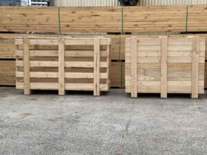 timber crate and timber case with stack of crating timbers in background